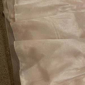 A light pink sparkly dress